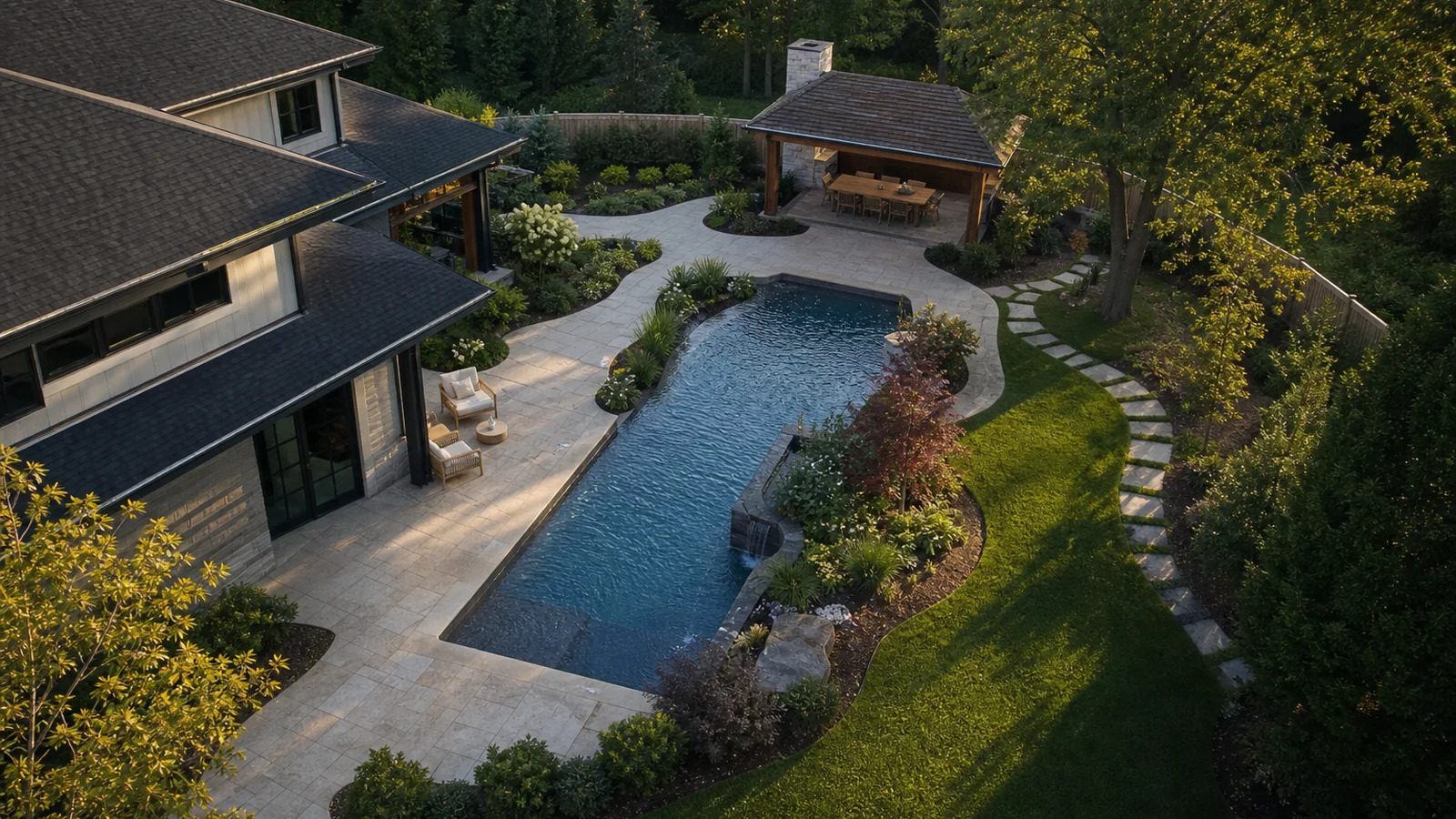 Pool, patio, shade, paths, and landscape planned as one connected backyard